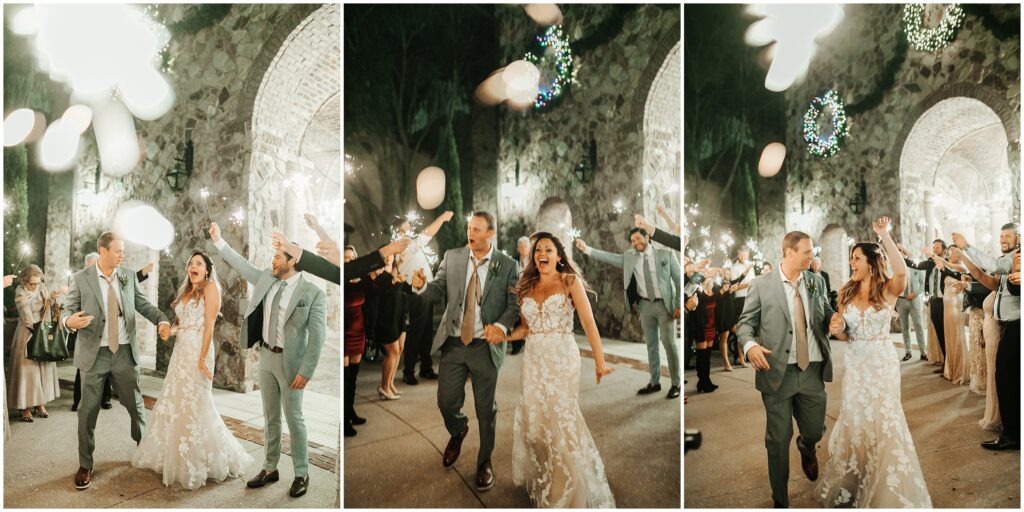 bride and groom sparkler exit photos; bride and groom smiling and holding hands while surrounded by guests at outdoor Orlando wedding venue