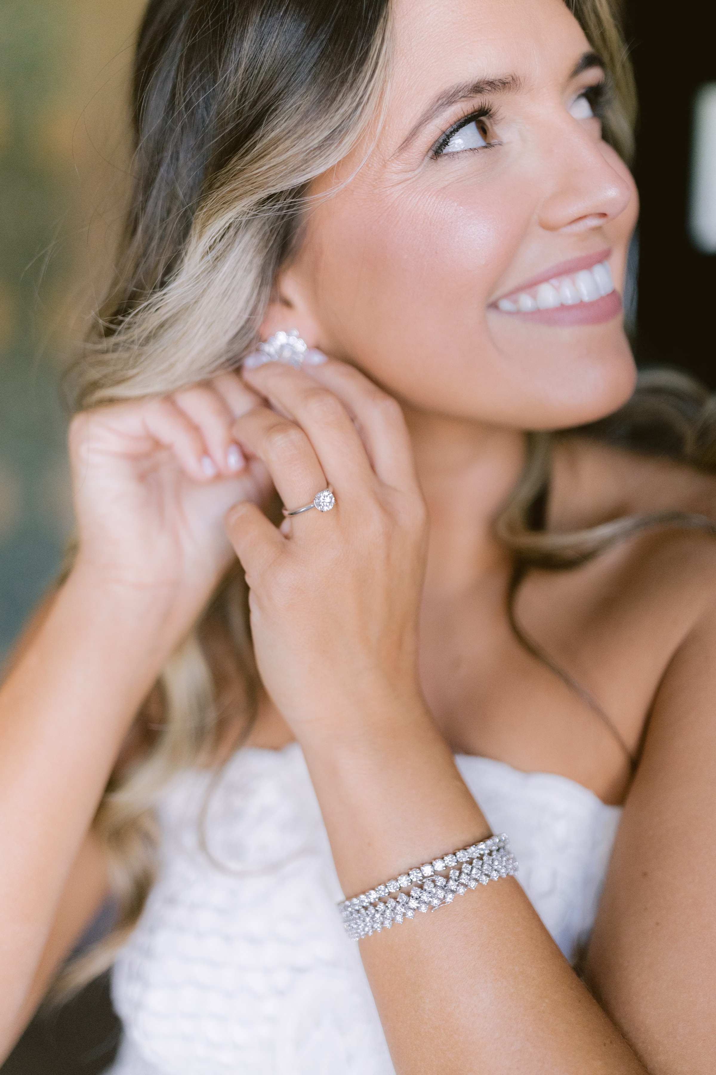 elegant bridal jewelry details pearl earrings diamond bracelet tampa wedding photographer