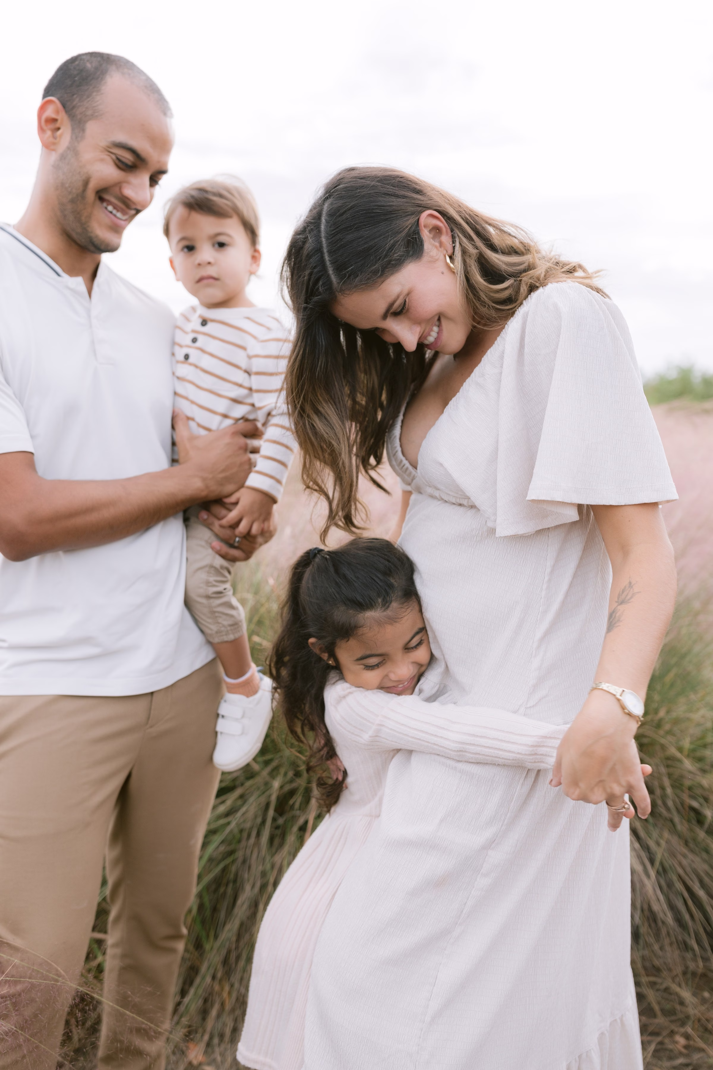 outdoor family maternity session tampa bay ashley izquierdo - Home Outdoor family maternity session in Tampa Bay by Ashley Izquierdo Photography featuring expecting mother in white dress with husband and children