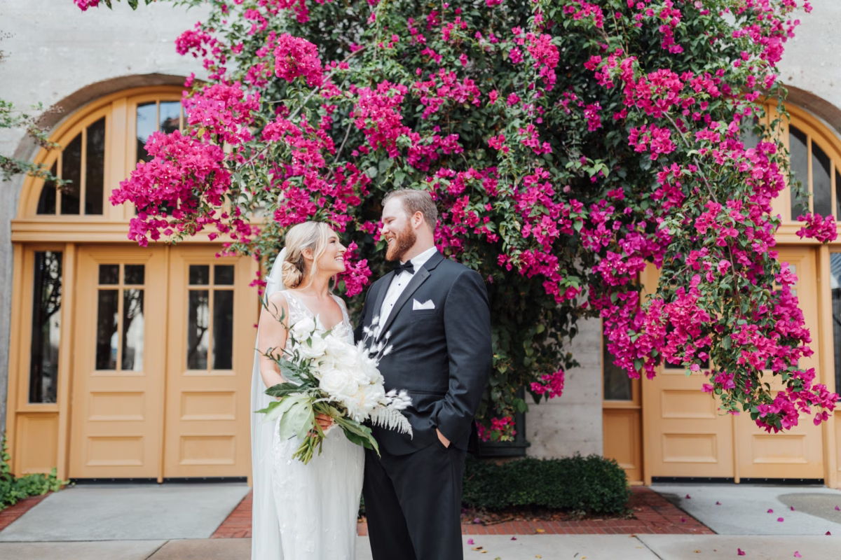 tampa wedding photographer bride groom portraits bougainvillea flowers ashley izquierdo