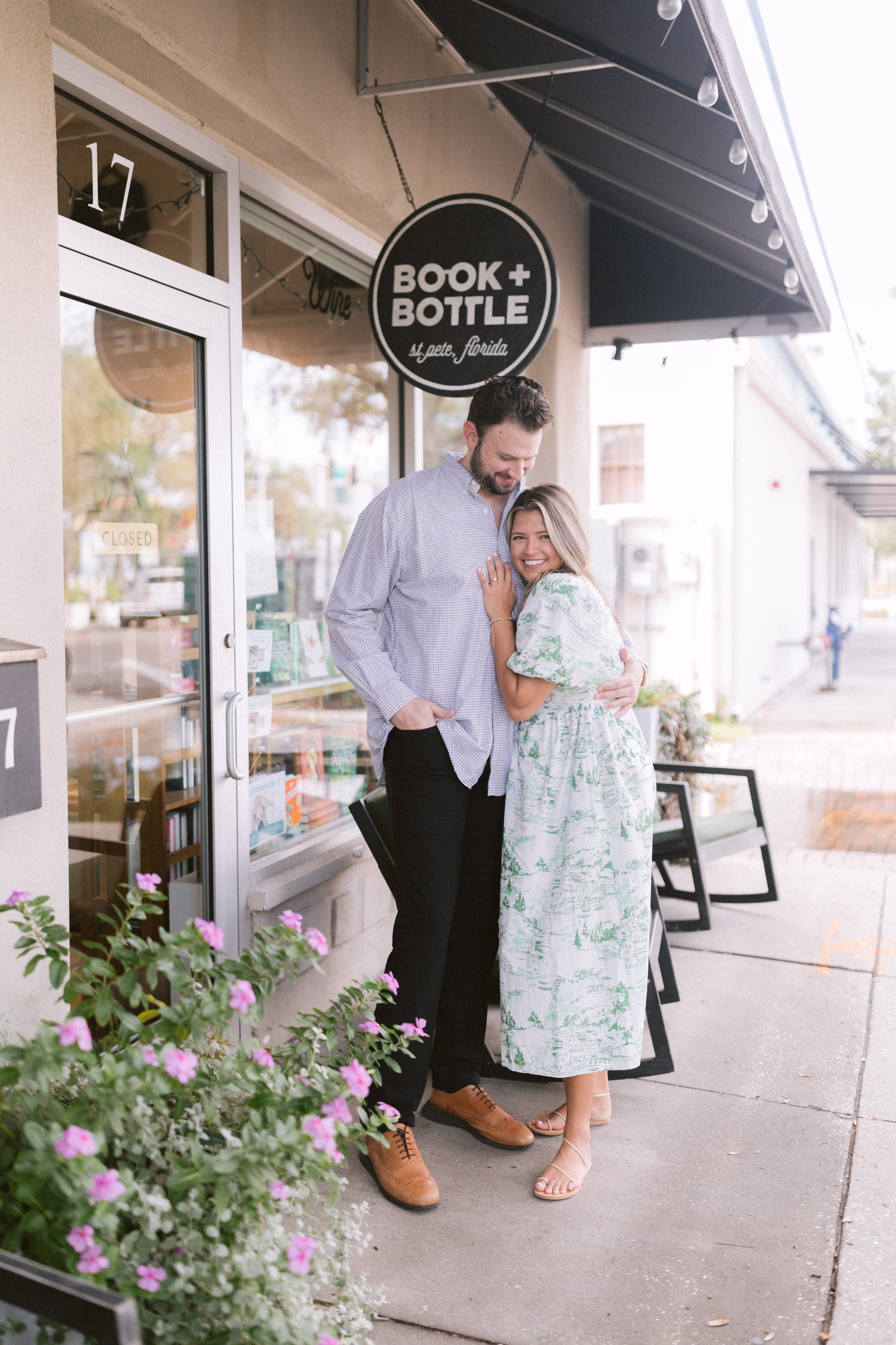 Romantic engagement session outside Book and Bottle in downtown St. Pete, Florida captured by Tampa Bay wedding photographer Ashley Izquierdo Photography