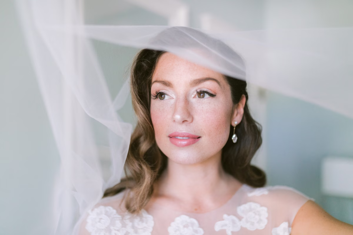 tampa bay bride wedding veil portrait experience - Experience Elegant Tampa Bay bride wearing flowing wedding veil and pearl earrings captured by Ashley Izquierdo Photography