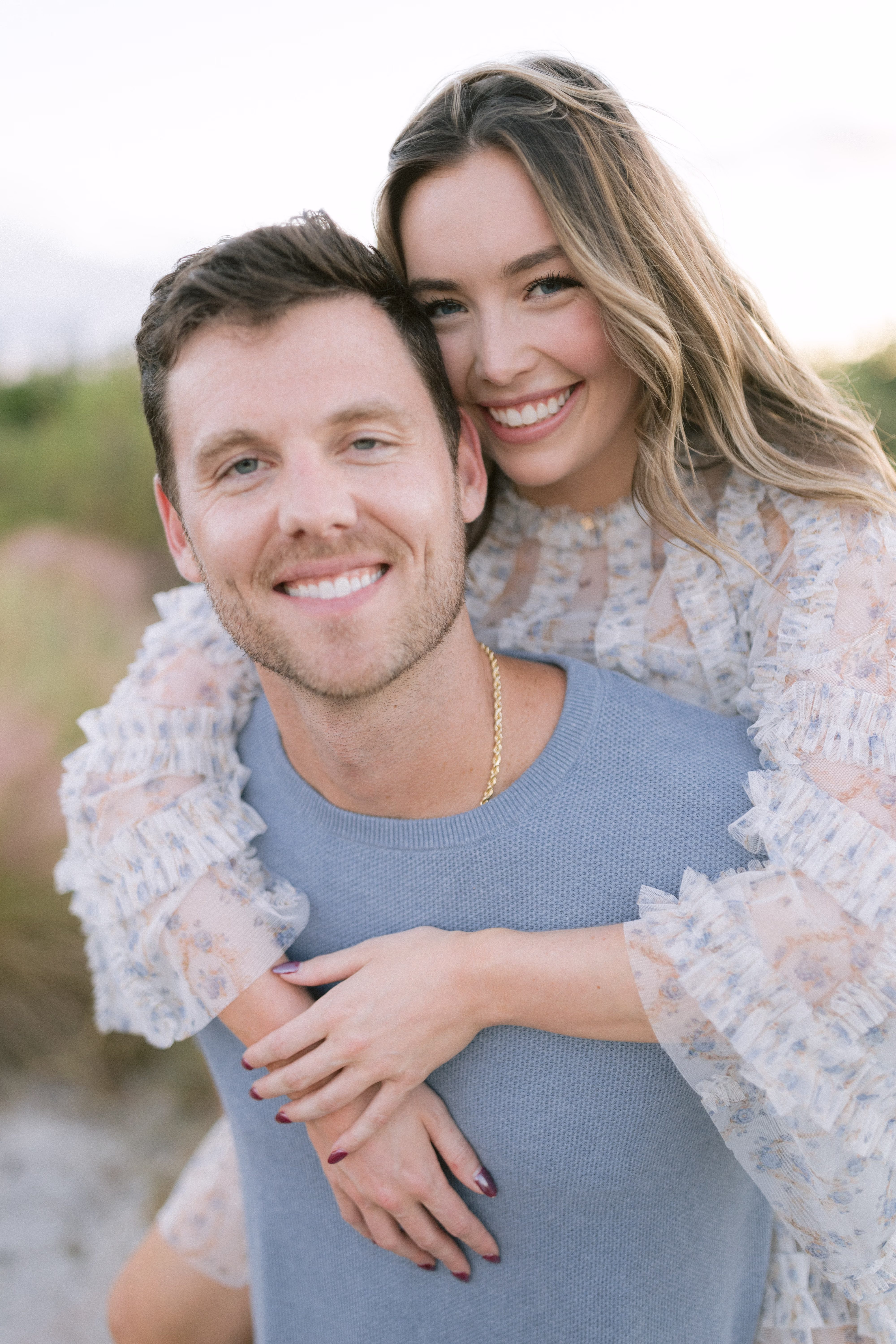 sunset photos cute couple portraits at sunset at cypress point park tampa Florida 