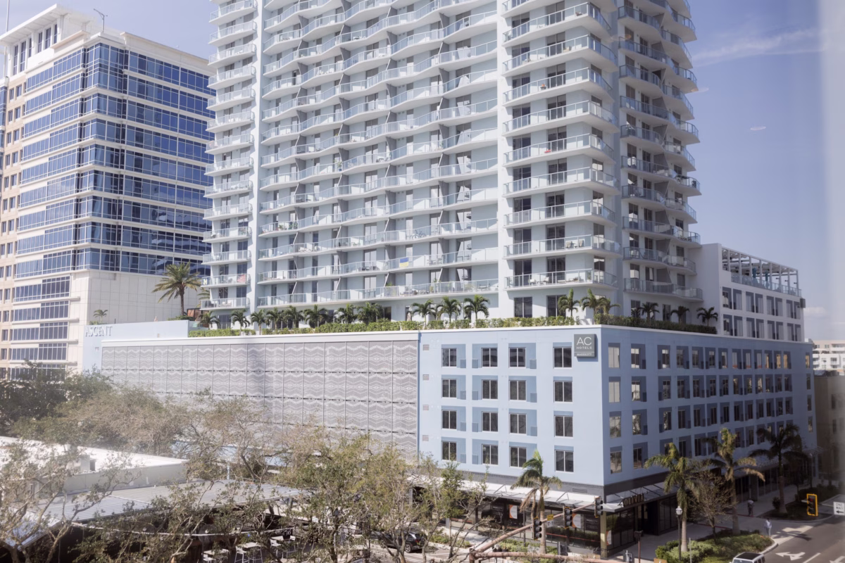 AC Hotel St Petersburg exterior showing modern white building architecture perfect for downtown wedding venues in St Petersburg Florida