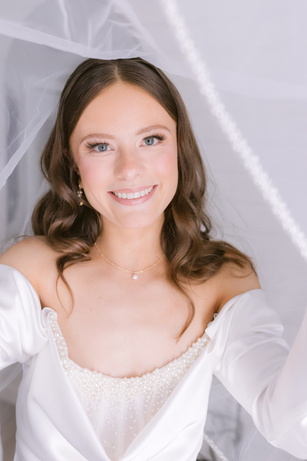 Elegant bridal portrait featuring White Traditions Bridal House wedding dress at Soire Estate Tampa garden wedding photographed by Ashley Izquierdo Photography