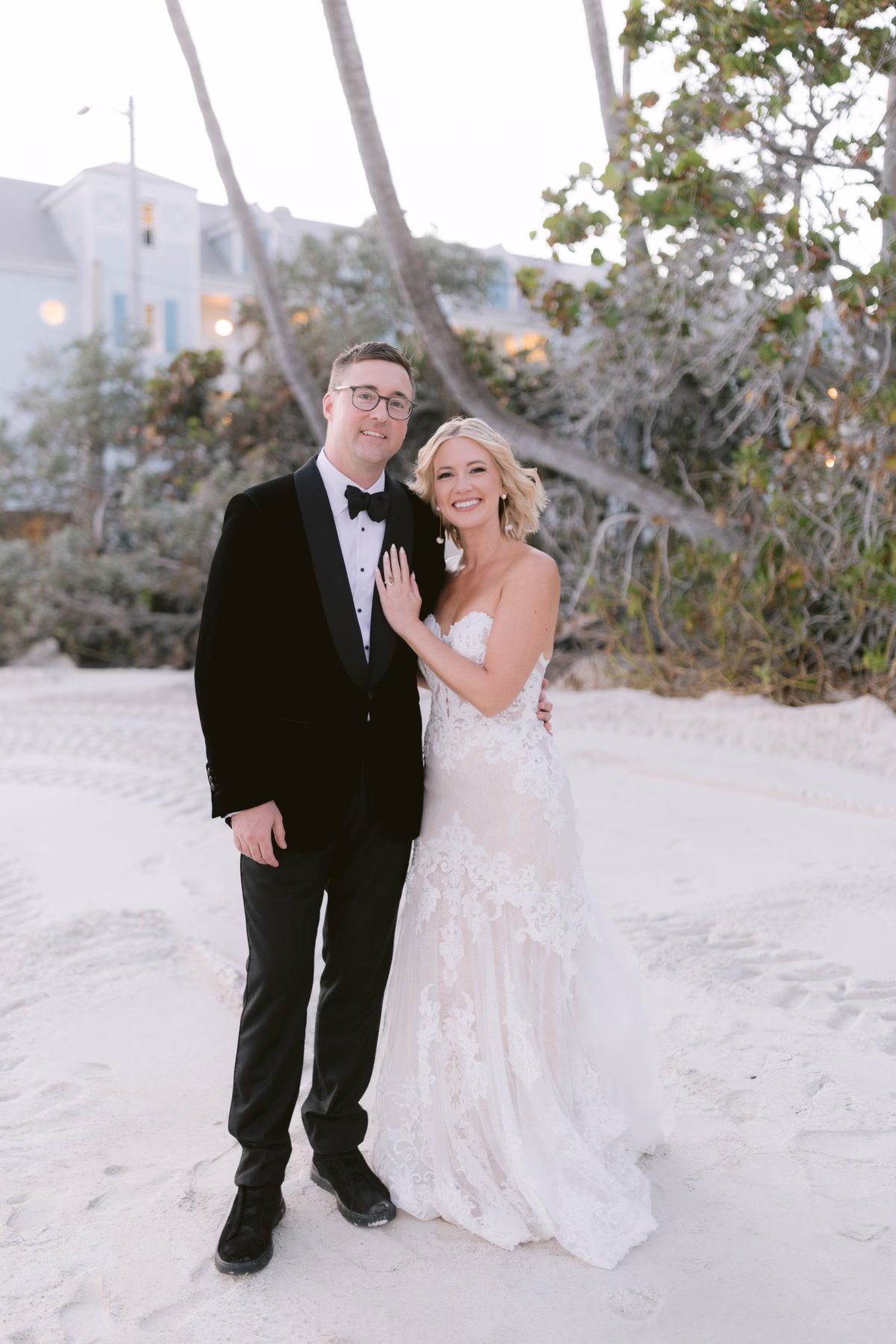 Elegant bride and groom wedding portraits on the beach at Casa Marina Key West captured by Ashley Izquierdo Photography