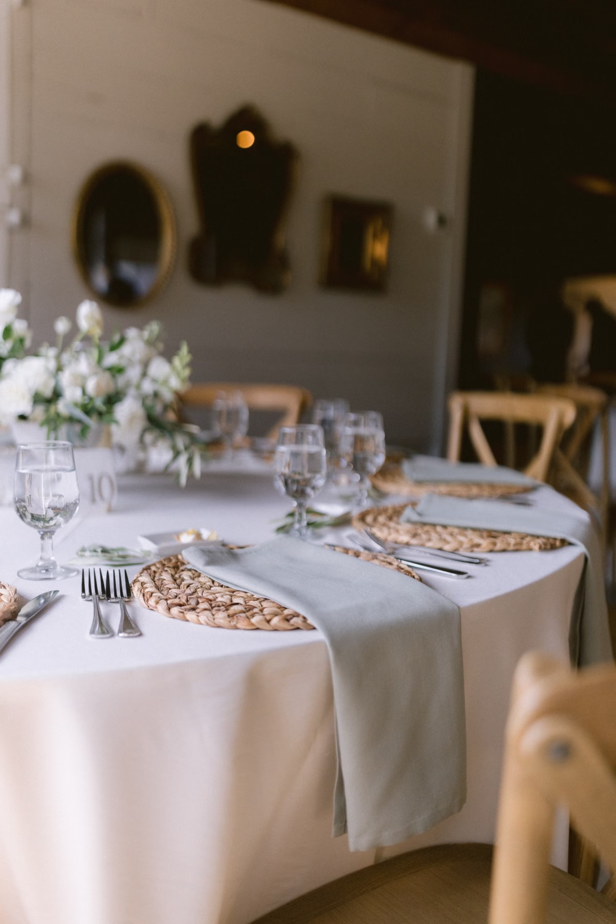 elegant farm wedding tablescape johnsons locust hall new jersey - A Farm Wedding at Johnson's Locust Hall, New Jersey Elegant wedding reception tablescape with white linens, woven chargers, and white floral centerpieces at Johnson's Locust Hall farm wedding in New Jersey by Ashley Izquierdo Photography