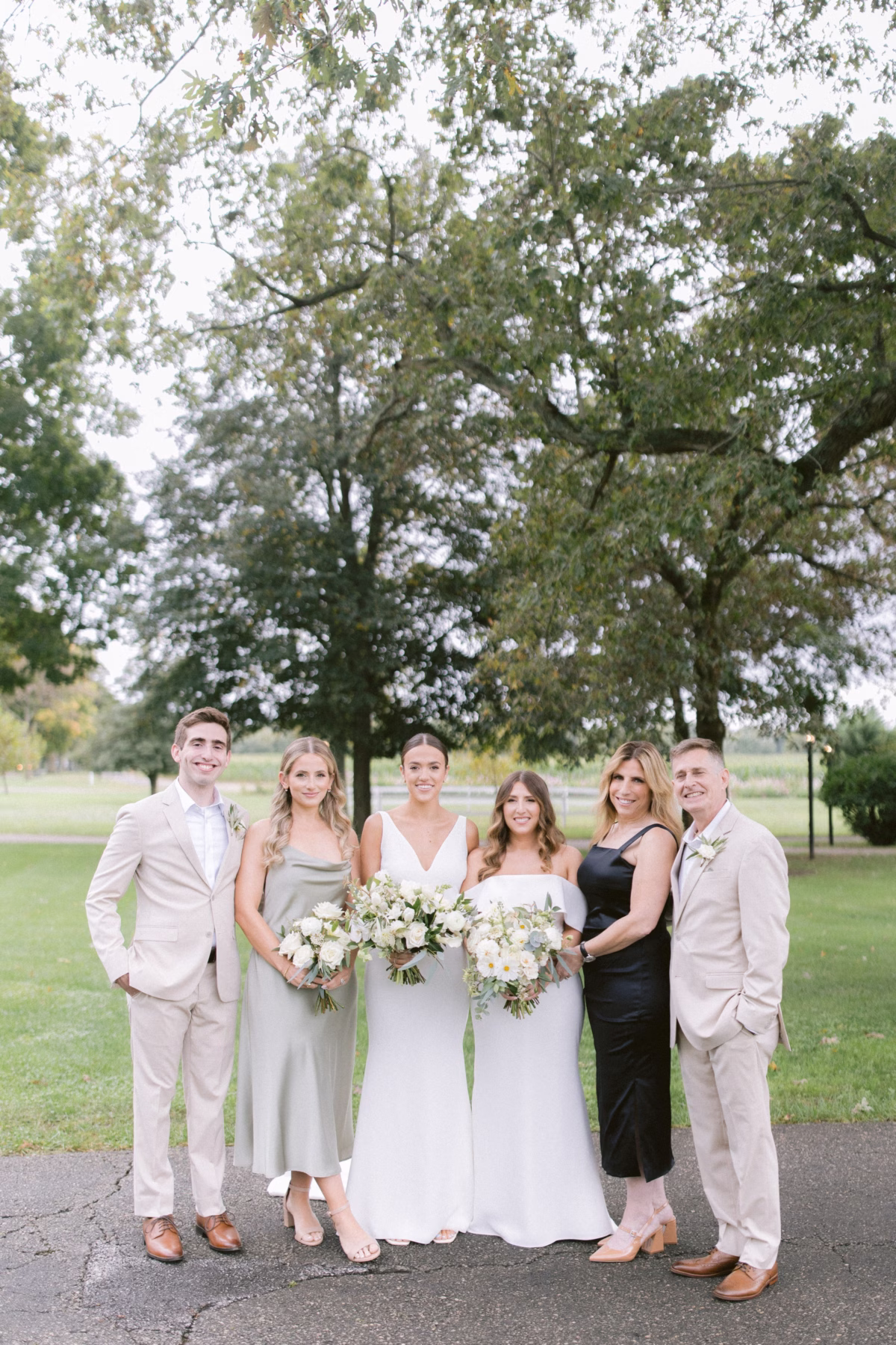 farm wedding family photos johnsons locust hall florist allie johnson - A Farm Wedding at Johnson's Locust Hall, New Jersey Farm wedding family portrait with white floral bouquets by Allie Johnson at Johnson's Locust Hall New Jersey photographed by Ashley Izquierdo Photography