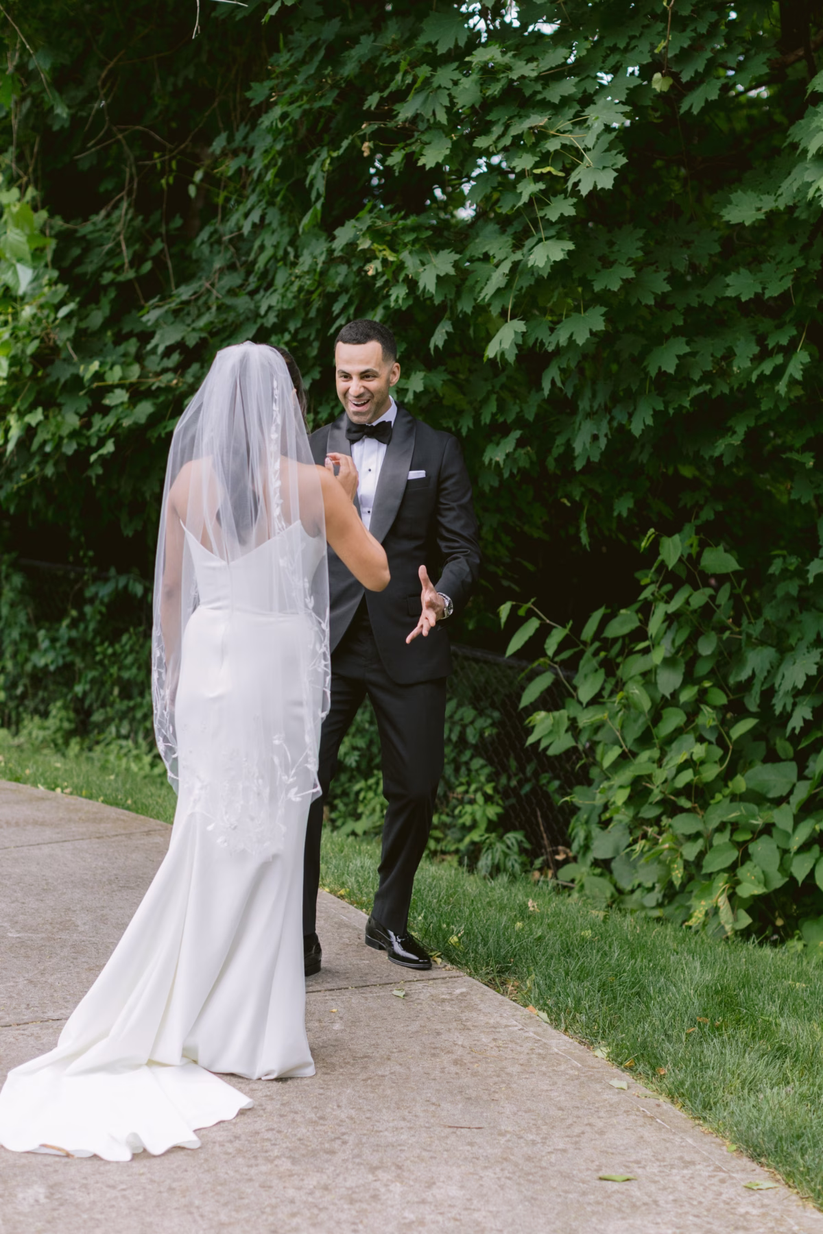 Groom sees bride for first look moment captured by Ashley Izquierdo Photography at The Roundhouse Beacon Hudson Valley wedding venue