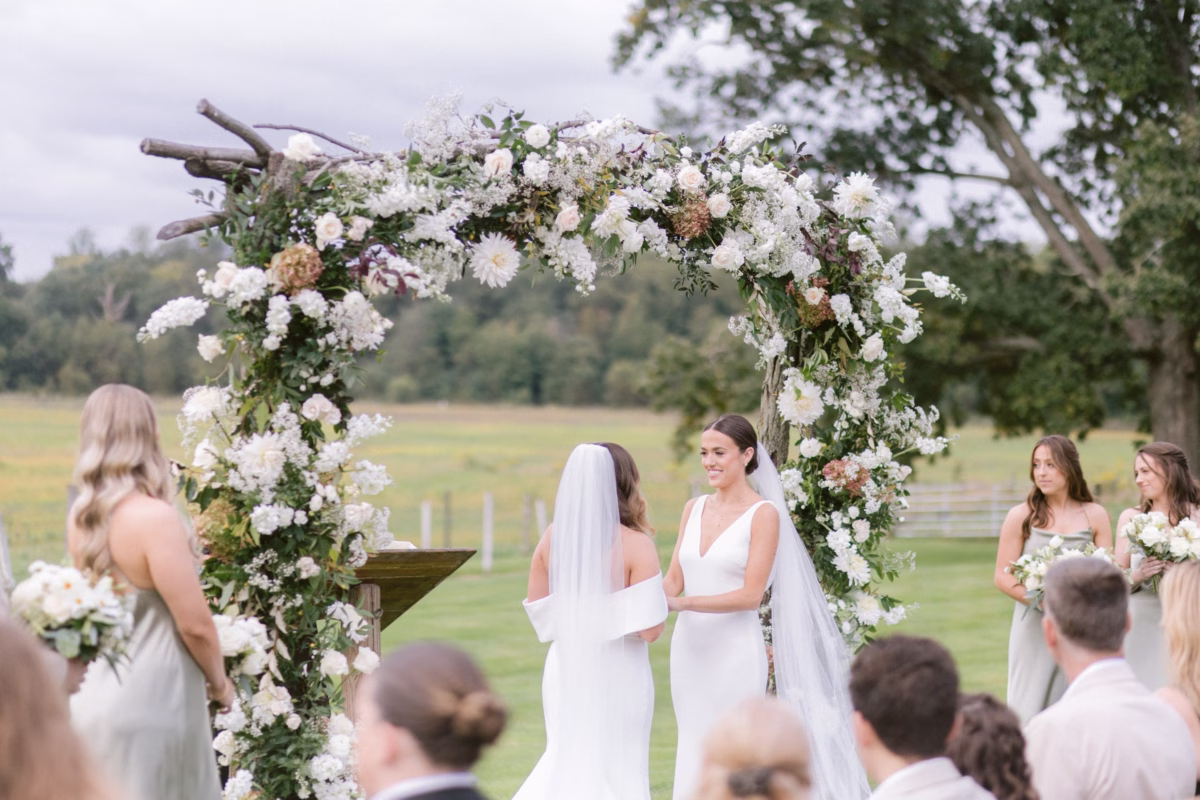 florist allie johnson white floral ceremony arch johnsons locust hall - A Farm Wedding at Johnson's Locust Hall, New Jersey White floral ceremony arch by Allie Johnson at Johnson's Locust Hall farm wedding in New Jersey photographed by Ashley Izquierdo Photography