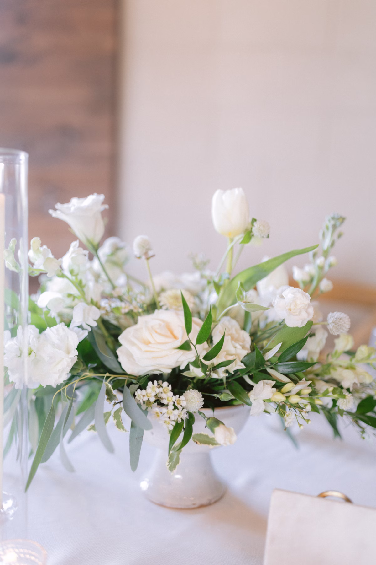 florist allie johnson white wedding centerpiece johnsons locust hall - A Farm Wedding at Johnson's Locust Hall, New Jersey White wedding centerpiece with roses and greenery by florist Allie Johnson at Johnson's Locust Hall New Jersey farm wedding