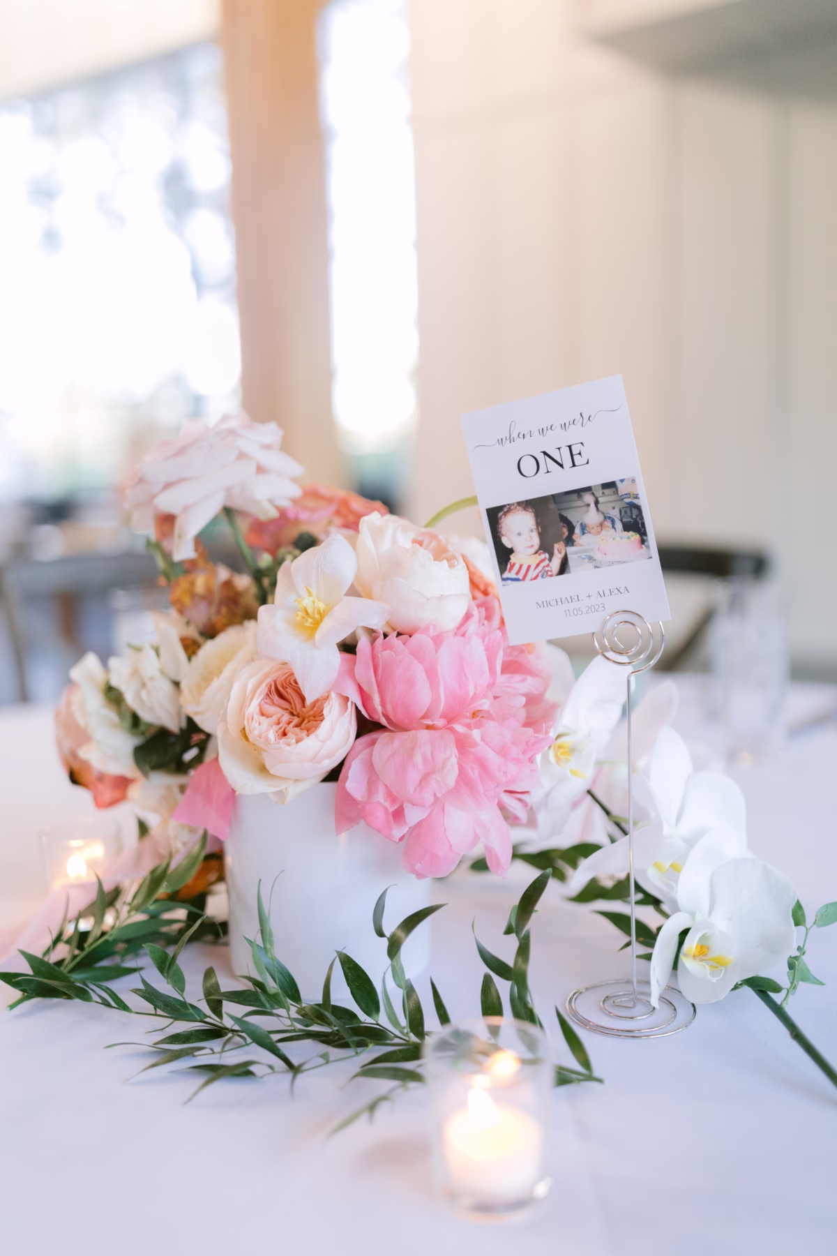 Elegant wedding table centerpiece with pink peonies and white garden roses by Golden Wild Florals at Soire Estate Tampa garden wedding
