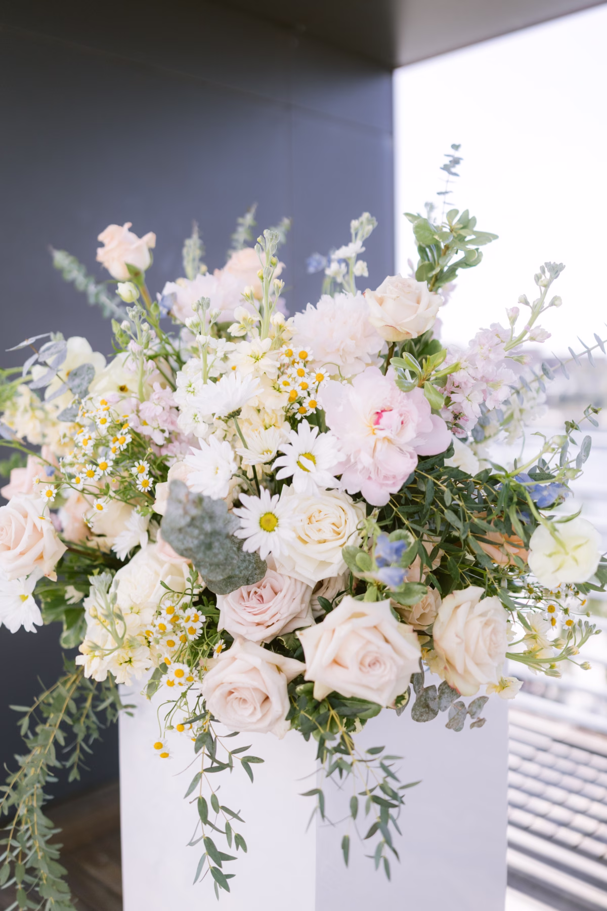 Romantic bridal bouquet with blush roses, white daisies and greenery by I Dew Events florist for Armature Works Tampa wedding photographed by Ashley Izquierdo Photography