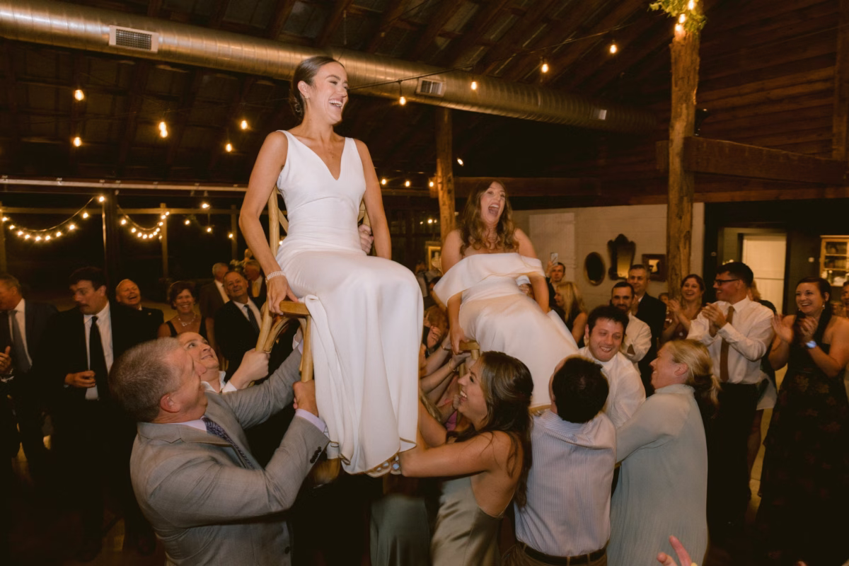 jewish wedding hora dance johnsons locust hall new jersey - A Farm Wedding at Johnson's Locust Hall, New Jersey Bride and groom lifted on chairs during traditional Jewish hora dance at Johnson's Locust Hall farm wedding in New Jersey