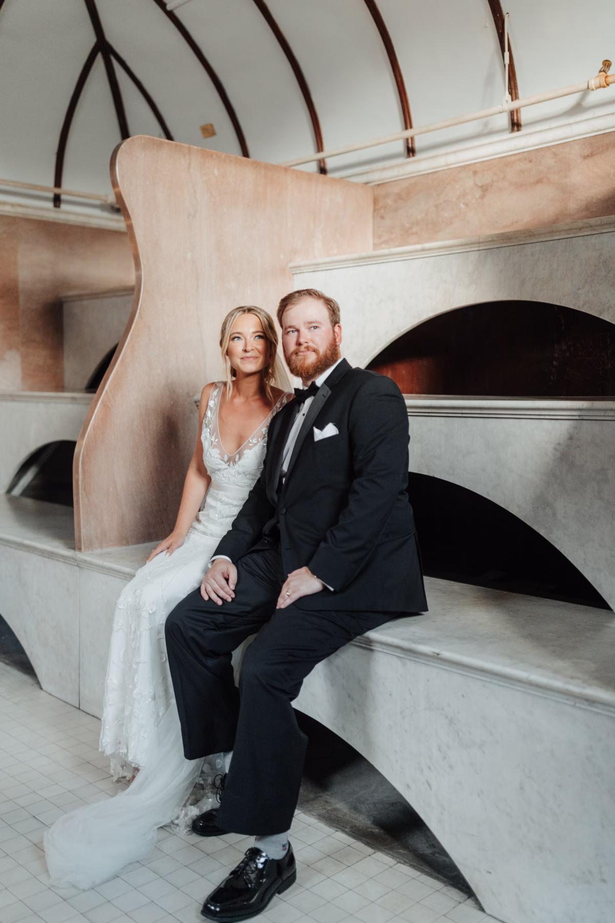 Elegant bride and groom portrait at The Lightner Museum historic venue coordinated by Coastal Celebrations wedding planning