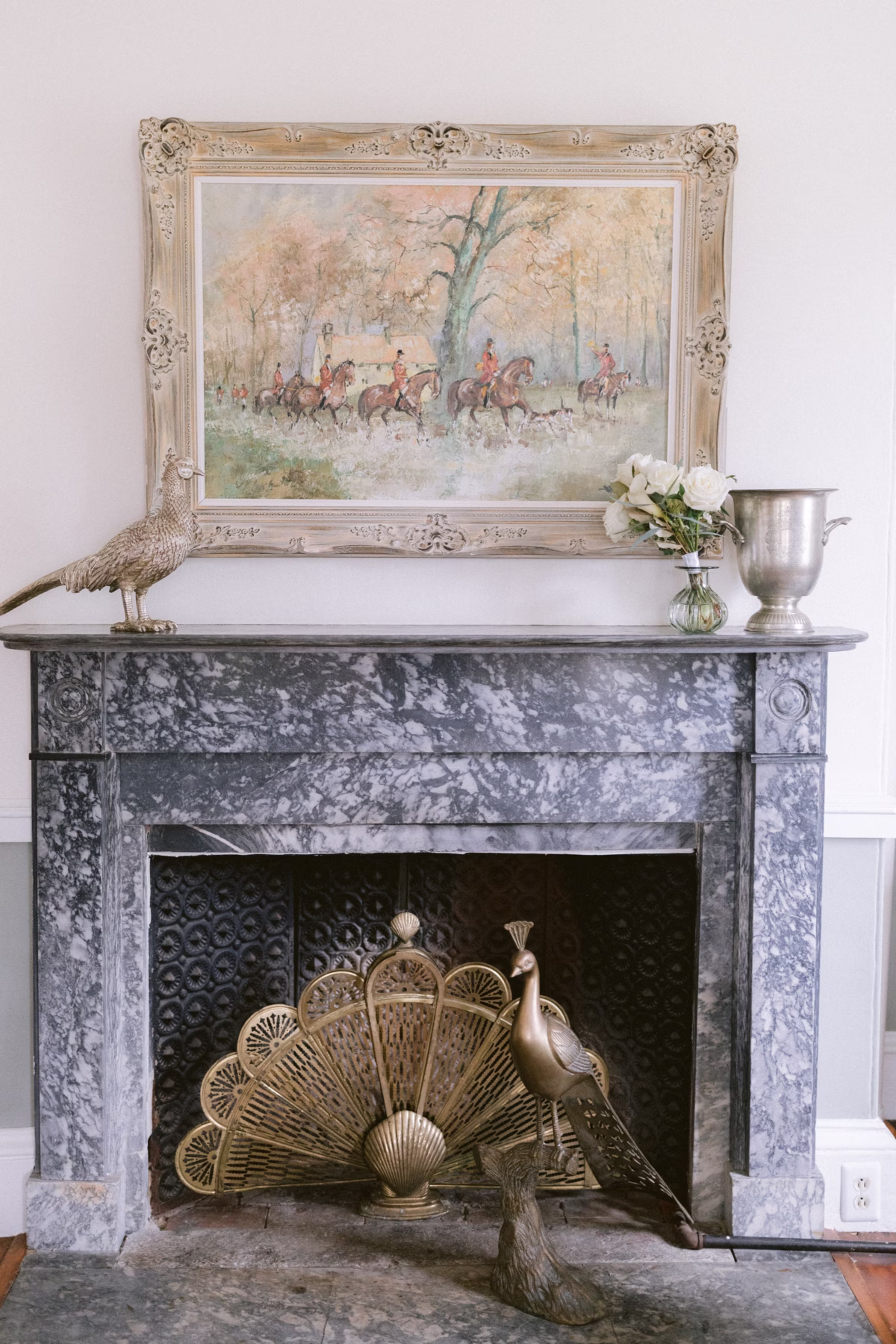luxury wedding venue johnsons locust hall new jersey fireplace decor - A Farm Wedding at Johnson's Locust Hall, New Jersey Elegant marble fireplace with peacock decorations and equestrian artwork at Johnson's Locust Hall wedding venue in New Jersey