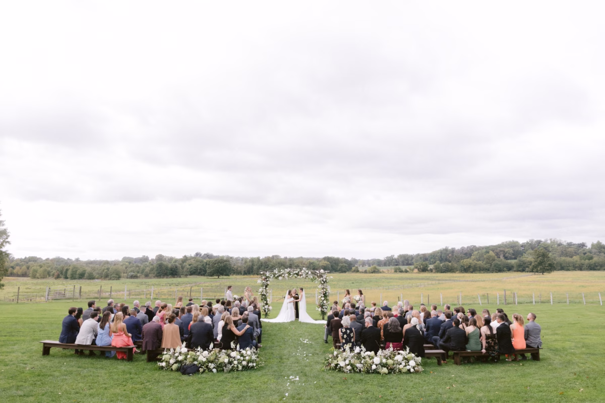 outdoor farm wedding ceremony johnsons locust hall new jersey olive and shae planning allie johnson florist - A Farm Wedding at Johnson's Locust Hall, New Jersey Outdoor wedding ceremony at Johnson's Locust Hall farm venue in New Jersey with white floral arch by Allie Johnson and planning by Olive and Shae