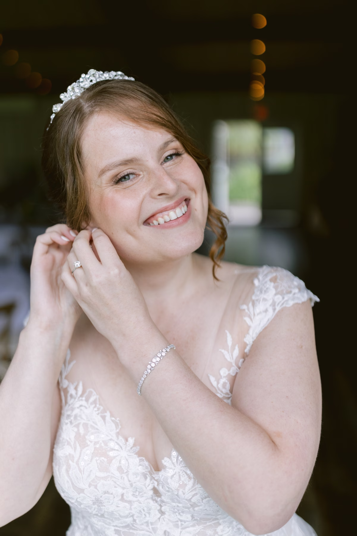 Radiant bride in Maggie Sottero lace wedding dress with crystal tiara at Red Maple Vineyard wedding photographed by Tampa Bay wedding photographer Ashley Izquierdo