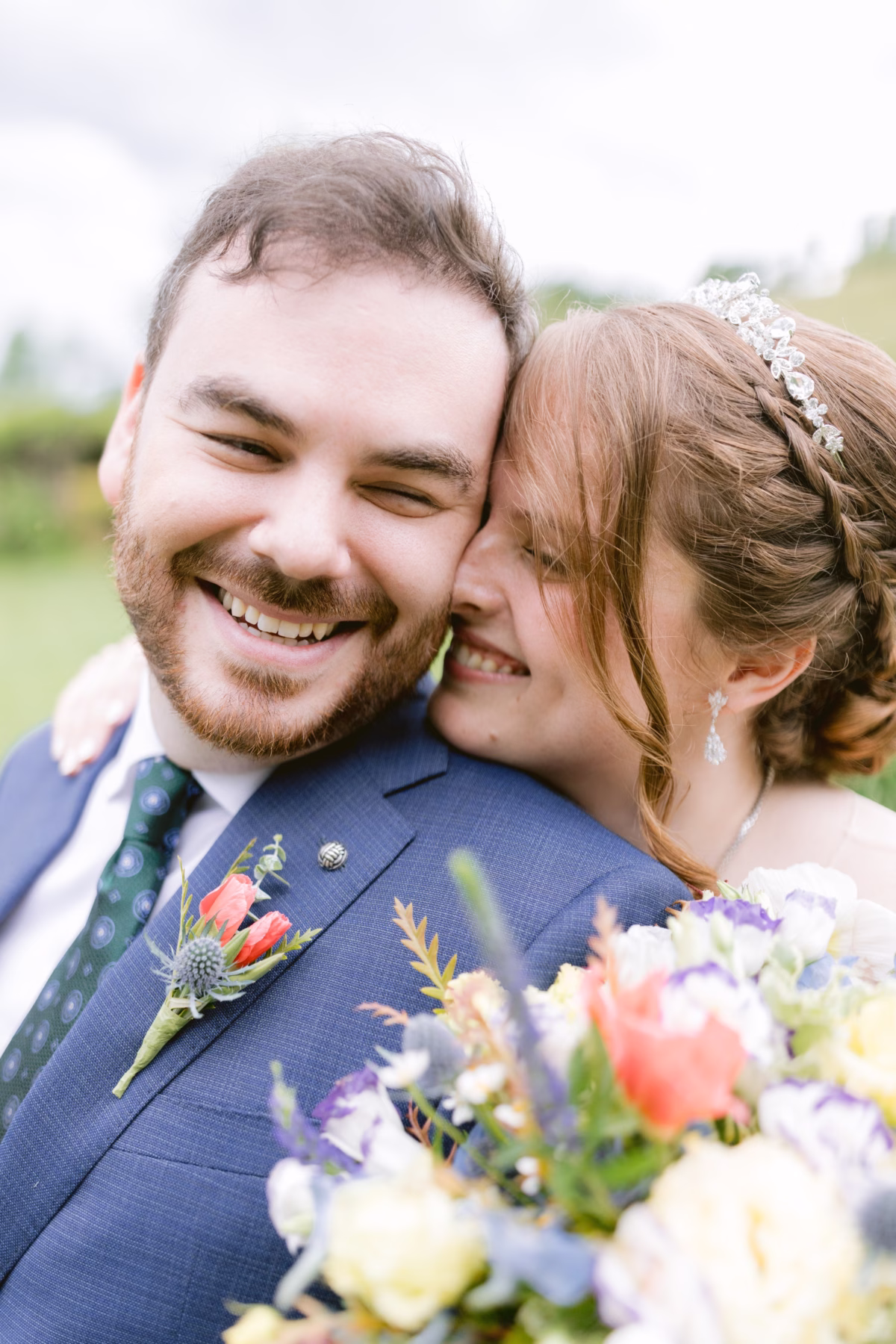 Bride and groom share intimate moment with wildflower bouquet by Cherry Brandy Designs at Red Maple Vineyard wedding captured by Tampa Bay photographer Ashley Izquierdo