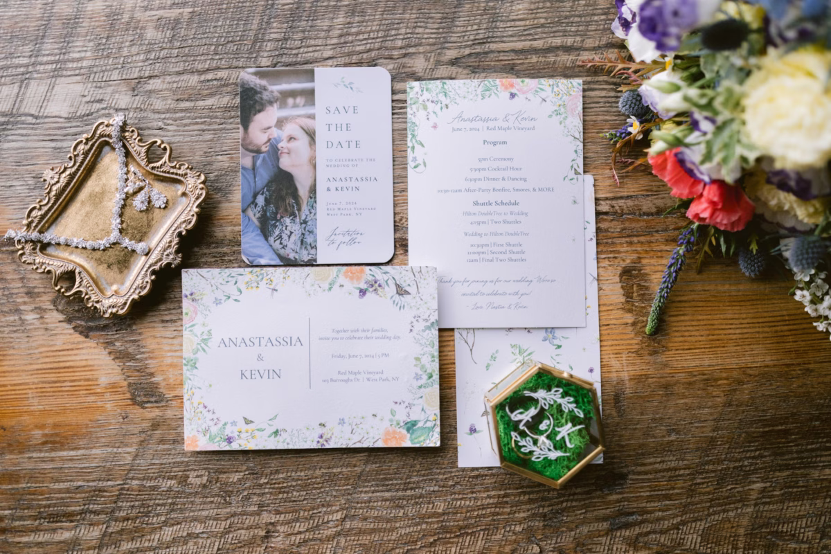 Wedding invitation suite with floral design by Zola and bridal bouquet by Cherry Brandy Designs at Red Maple Vineyard wedding photographed by Ashley Izquierdo Photography