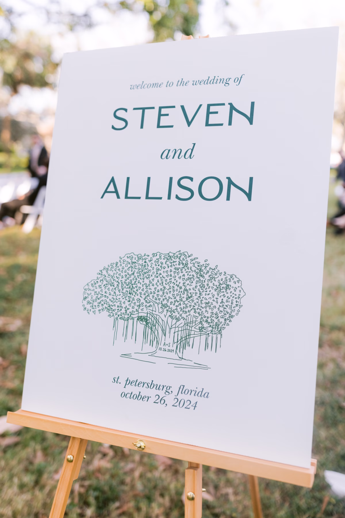 Wedding welcome sign with banyan tree illustration by A&P Design at St. Petersburg art museum wedding photographed by Ashley Izquierdo Photography