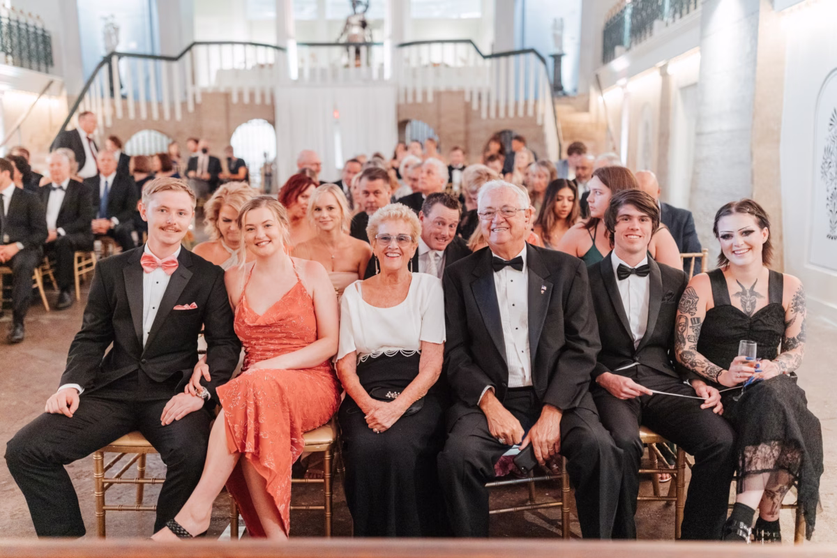 Wedding ceremony guests seated in elegant chairs at The Lightner Museum in St. Augustine coordinated by Coastal Celebrations wedding planning