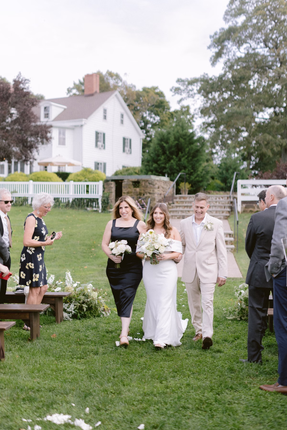 wedding ceremony processional johnsons locust hall new jersey - A Farm Wedding at Johnson's Locust Hall, New Jersey Bride and groom walk down the aisle together during outdoor wedding ceremony at Johnson's Locust Hall farm venue in New Jersey