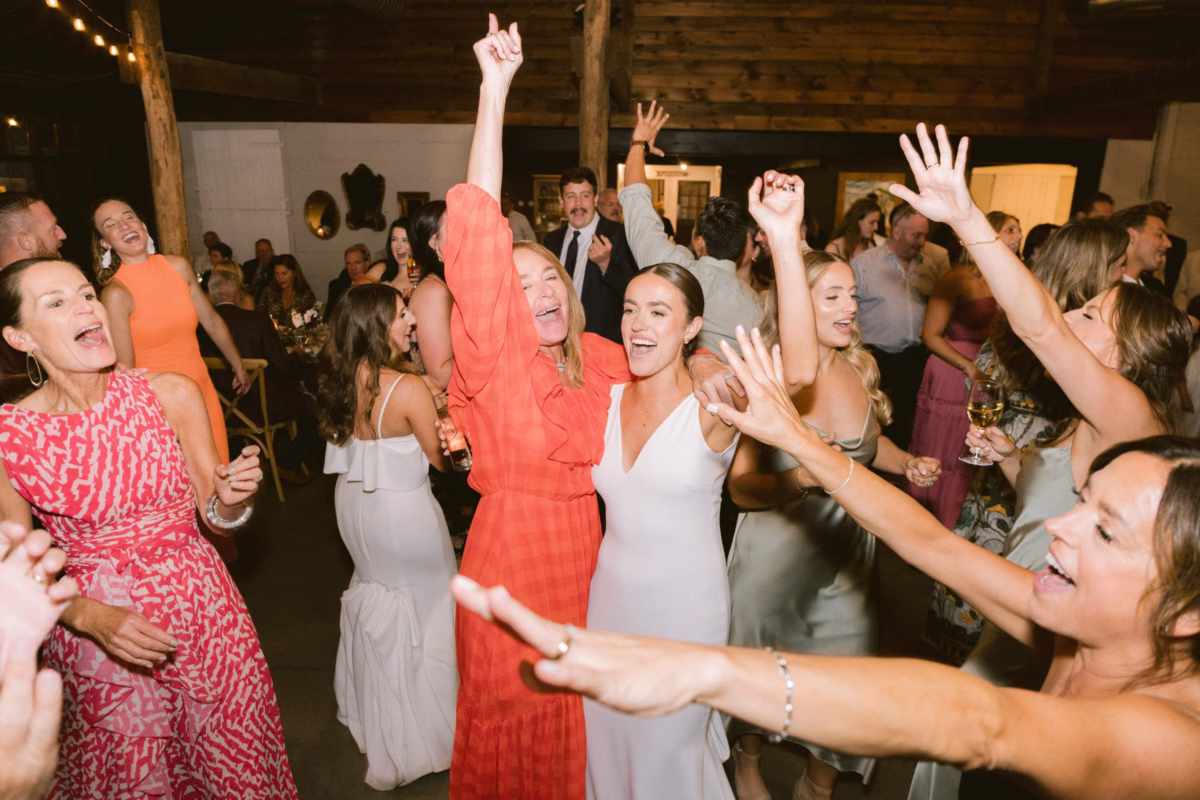 wedding dancing johnsons locust hall new jersey reception - A Farm Wedding at Johnson's Locust Hall, New Jersey Wedding guests dancing and celebrating at Johnson's Locust Hall farm wedding reception in New Jersey