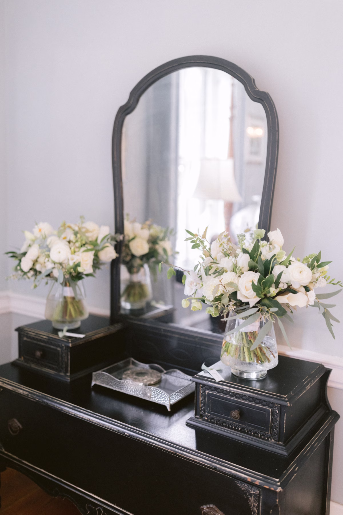 wedding florals allie johnson florist johnsons locust hall new jersey - A Farm Wedding at Johnson's Locust Hall, New Jersey White wedding bouquets and floral arrangements by Allie Johnson displayed on vintage vanity at Johnson's Locust Hall farm wedding in New Jersey