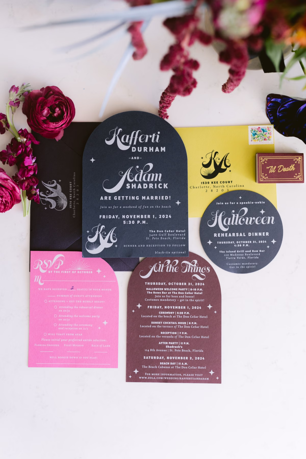 Halloween themed wedding invitation suite with dark and colorful cards featuring burgundy flowers at The Reach Key West wedding photographed by Ashley Izquierdo Photography