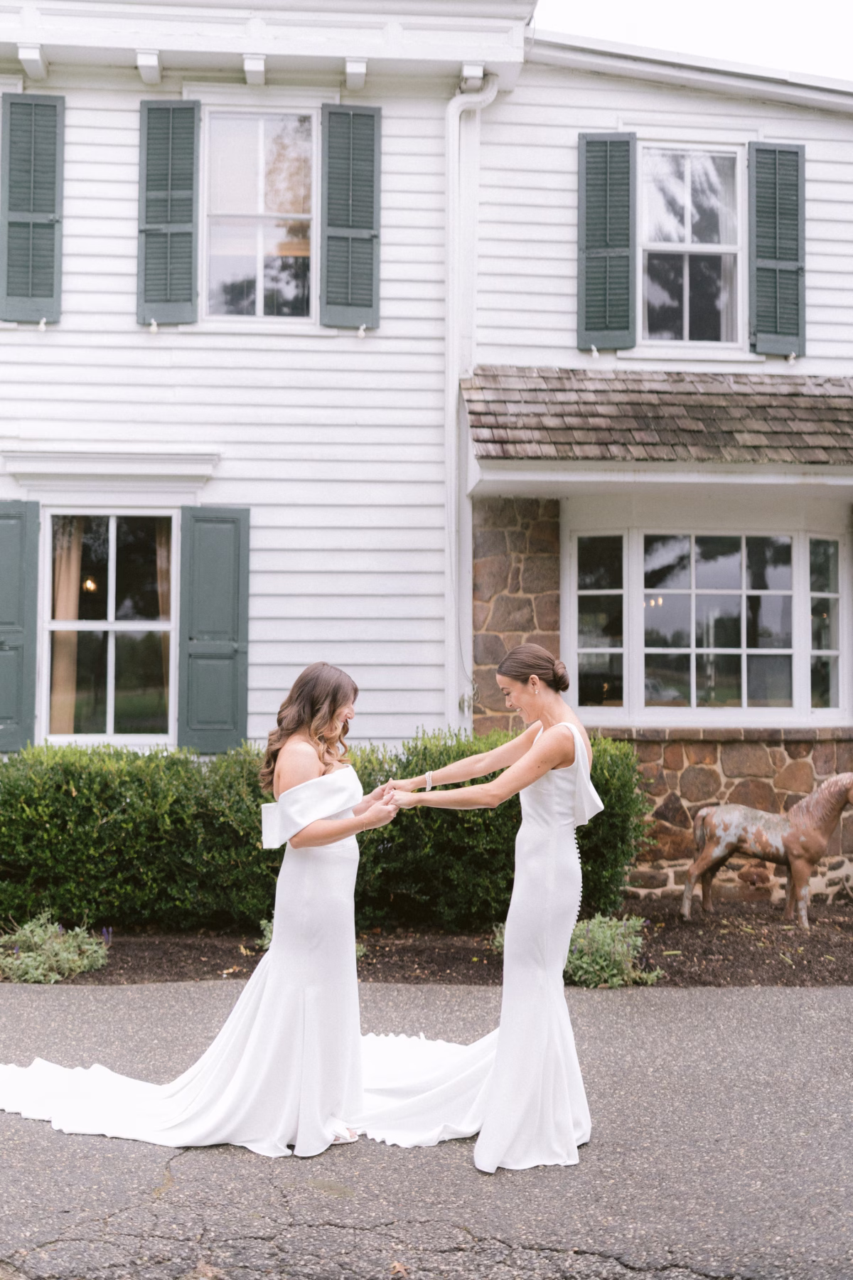 wedding planning olive and shae johnsons locust hall first look - A Farm Wedding at Johnson's Locust Hall, New Jersey Two brides in white dresses sharing an intimate first look moment at Johnson's Locust Hall farm wedding coordinated by Olive and Shae