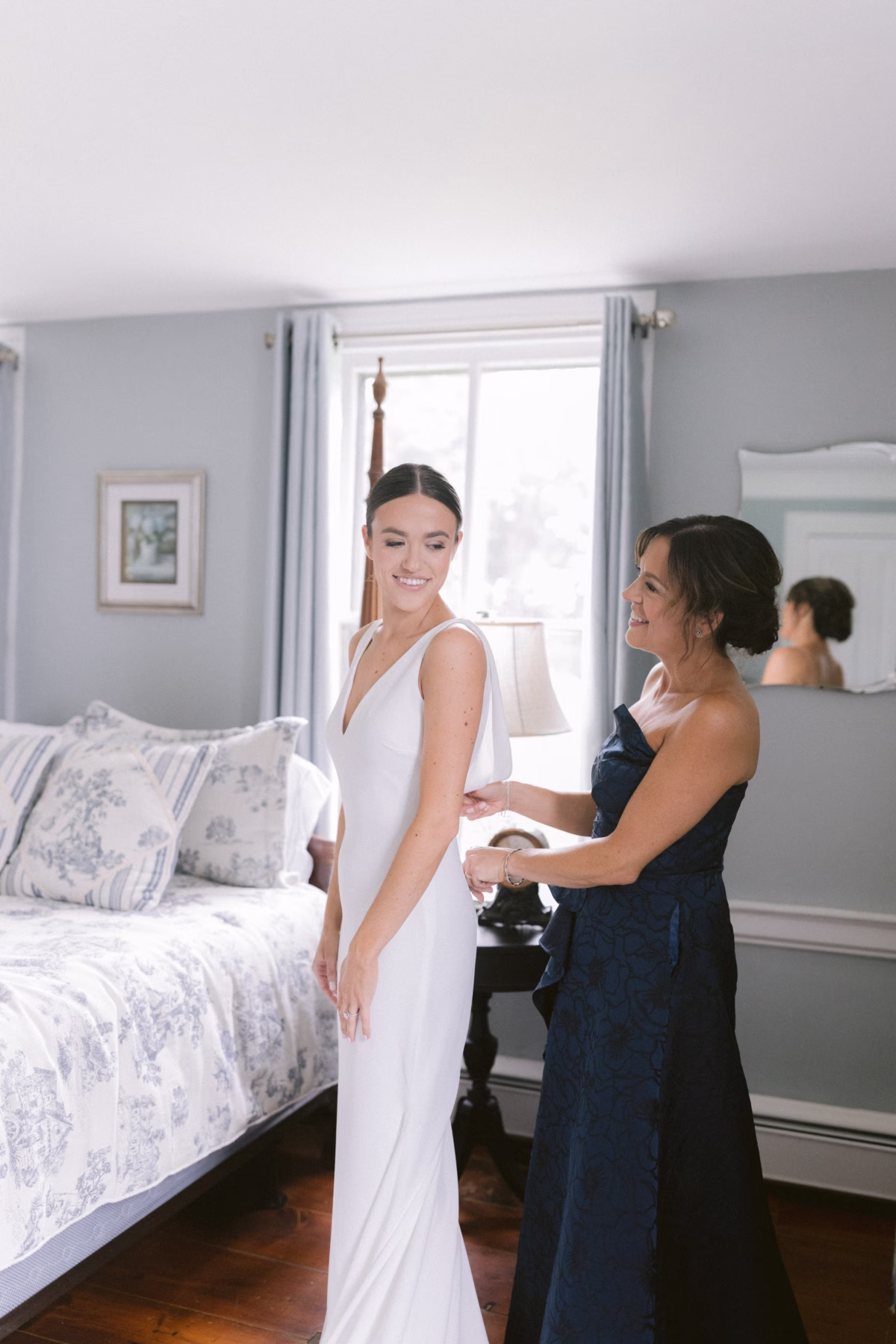 wedding planning olive and shae johnsons locust hall getting ready - A Farm Wedding at Johnson's Locust Hall, New Jersey Bride getting ready in white dress with wedding planner assistance at Johnson's Locust Hall farm wedding coordinated by Olive and Shae