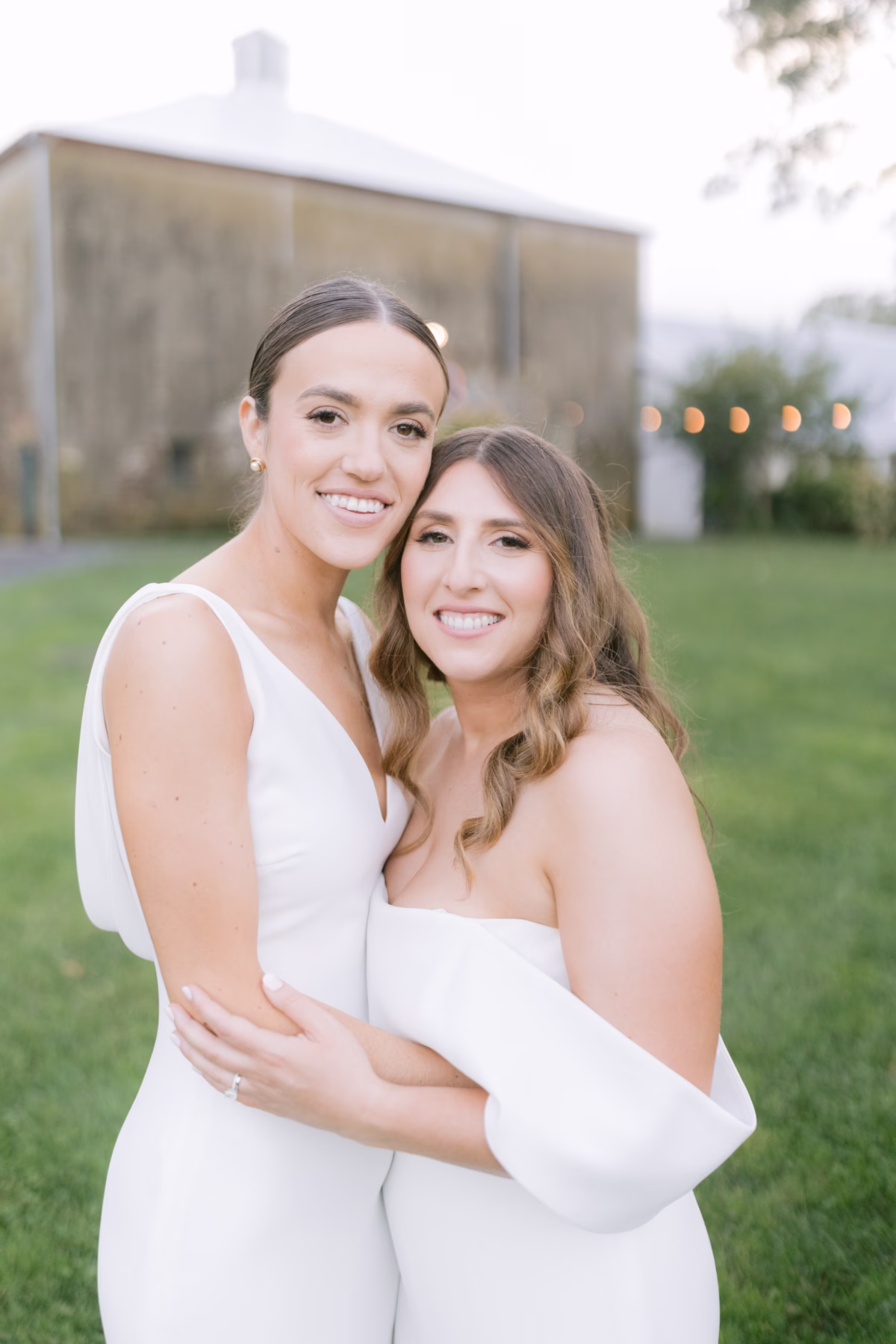 wedding planning olive and shae johnsons locust hall new jersey - A Farm Wedding at Johnson's Locust Hall, New Jersey Two brides in white dresses embracing during their farm wedding at Johnson's Locust Hall in New Jersey, planned by Olive and Shae