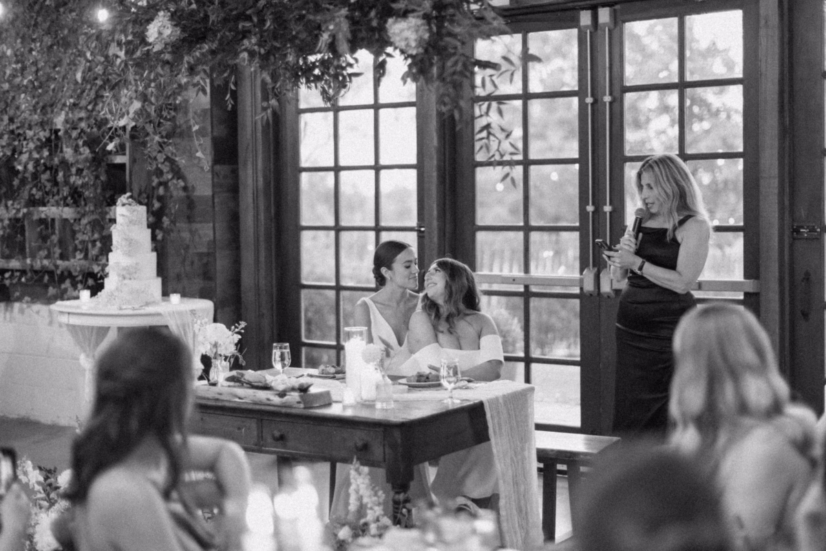 wedding planning olive and shae johnsons locust hall reception speech - A Farm Wedding at Johnson's Locust Hall, New Jersey Wedding planner coordinating reception speeches at Johnson's Locust Hall farm wedding venue with couple seated at sweetheart table