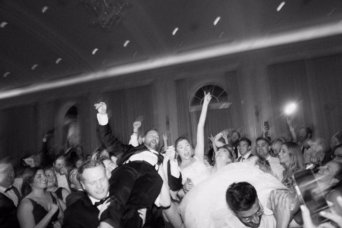 Energetic wedding reception dancing with live music by Bay Kings Band at The Vinoy St Petersburg captured by Ashley Izquierdo Photography