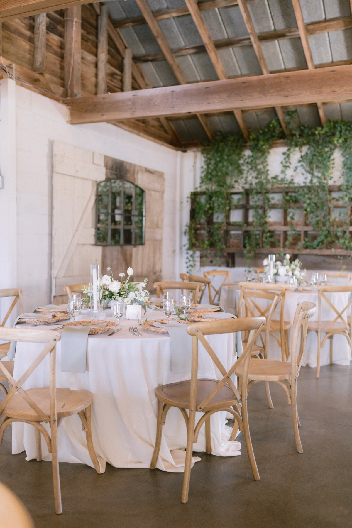 wedding reception decor florist allie johnson johnsons locust hall - A Farm Wedding at Johnson's Locust Hall, New Jersey Elegant farm wedding reception with rustic wooden cross-back chairs and floral centerpieces by Allie Johnson at Johnson's Locust Hall in New Jersey